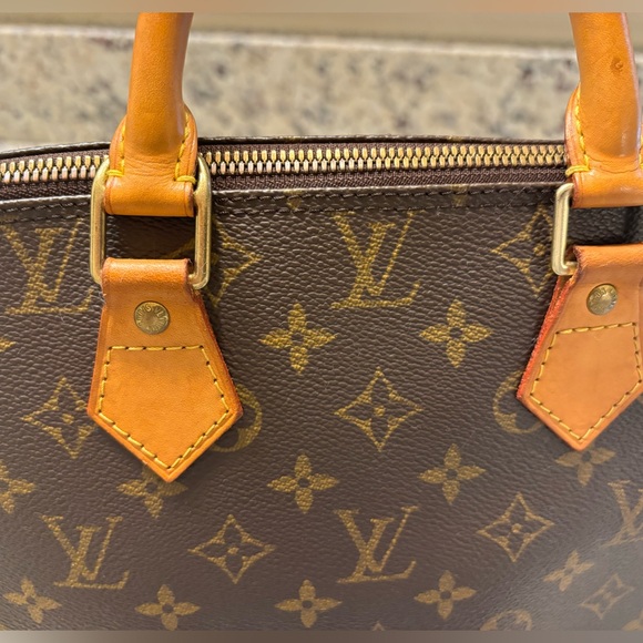 Authentic LOUIS VUITTON Alma Handbag - Picture 7 of 17